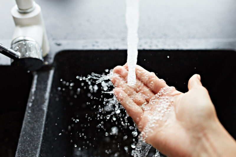 Water,Is,Running,From,A,Faucet