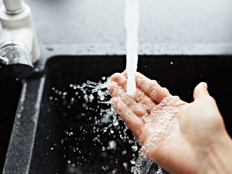 Water,Is,Running,From,A,Faucet